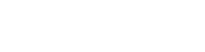 Der Schriftzug "Wombats Café" in Weiß.